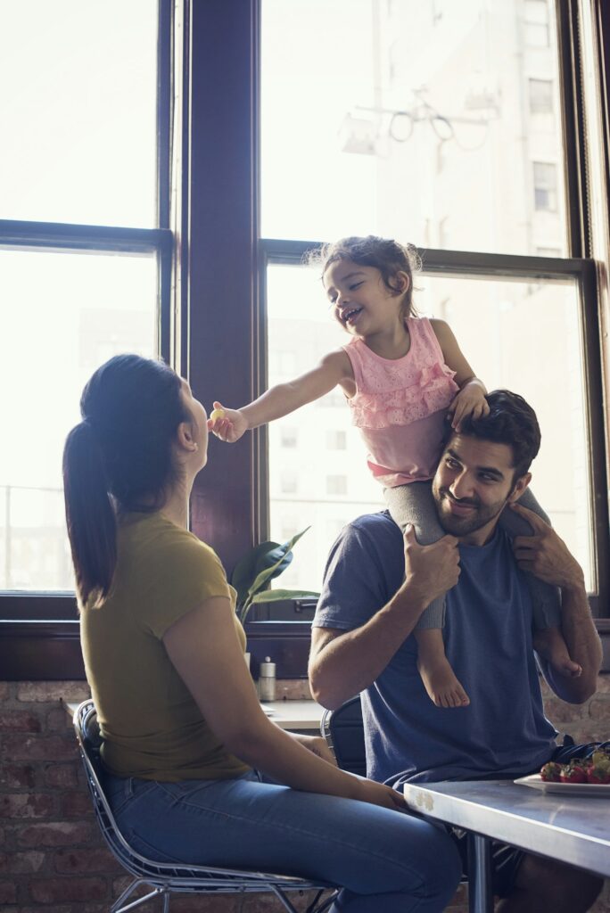 Happy family having fun in the kitchen